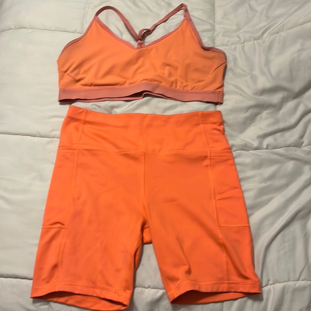 Orange Two Piece Workout Set High Waisted Bottoms Sports Bra Racerback Pockets